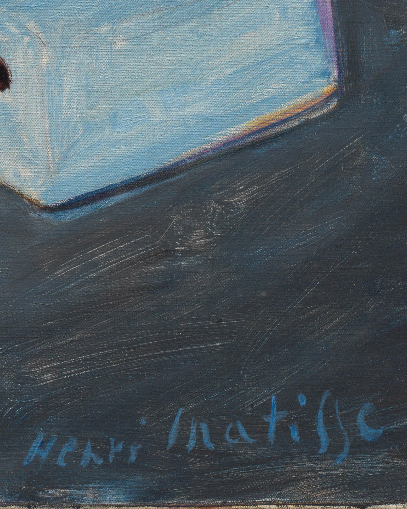 Artistic signature of Henri Matisse on a dark surface with a blue background